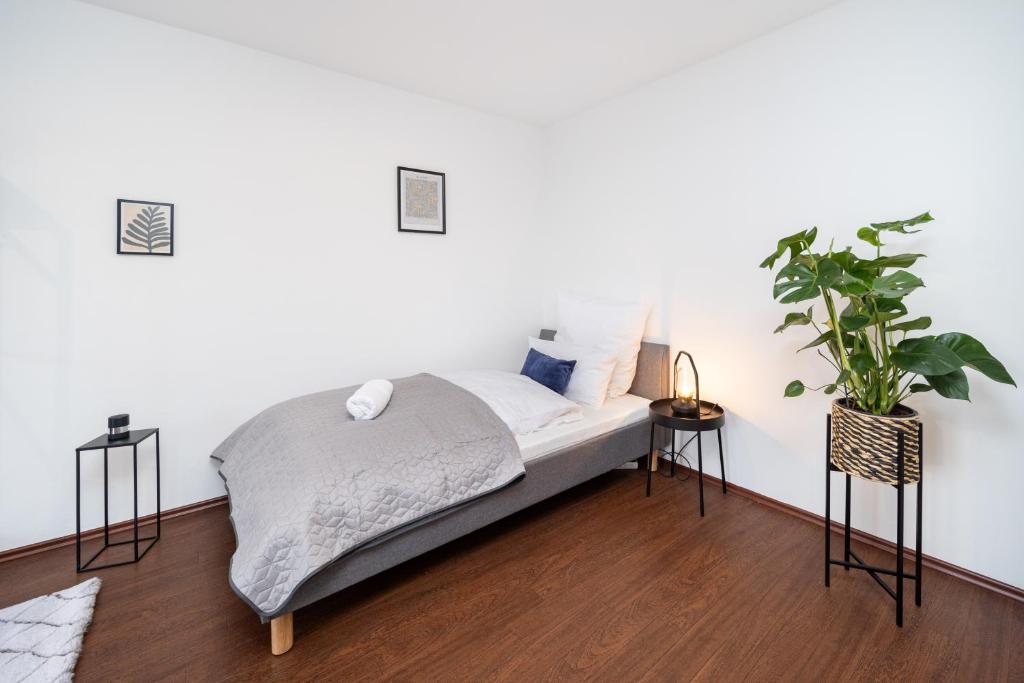 Postel nebo postele na pokoji v ubytování LaDolceVita - 100m2 Apartment in Zentraler Lage