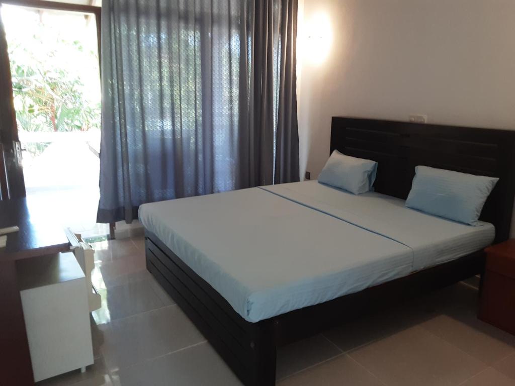 Postel nebo postele na pokoji v ubytování Pahalage Guesthouse