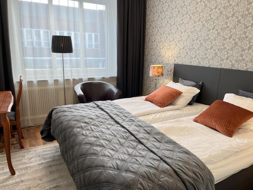 Postel nebo postele na pokoji v ubytování Hotell Bele