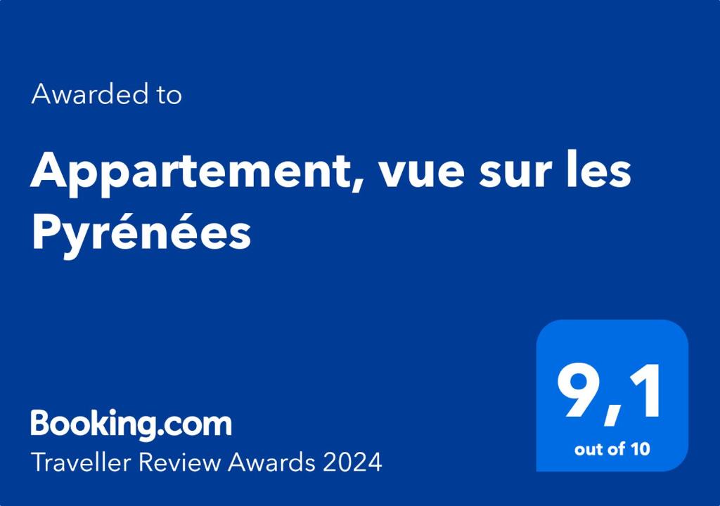 ein blaues Schild mit den Worten "Vereinbarung" und "Übereinkunft" in der Unterkunft Appartement, vue sur les Pyrénées in Pouillon