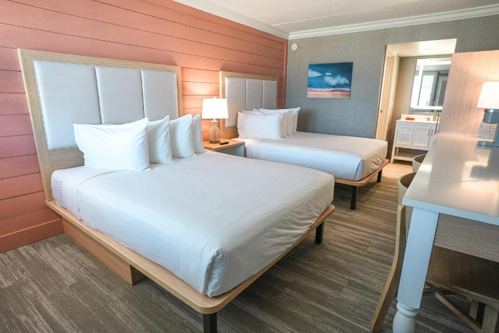 Postel nebo postele na pokoji v ubytování Spray Beach Hotel