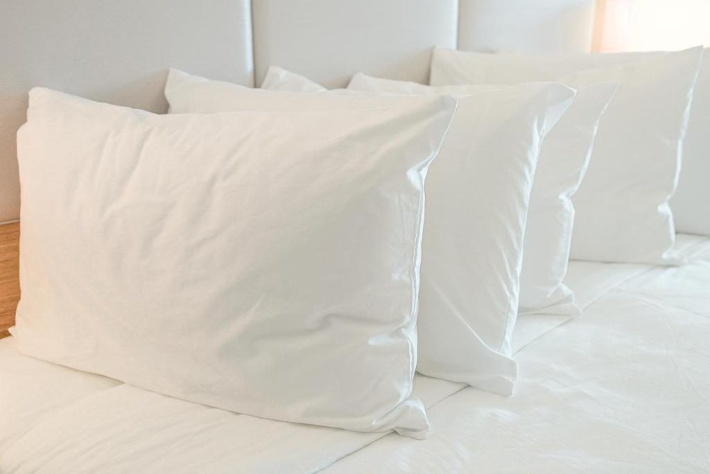 Postel nebo postele na pokoji v ubytování Spray Beach Hotel