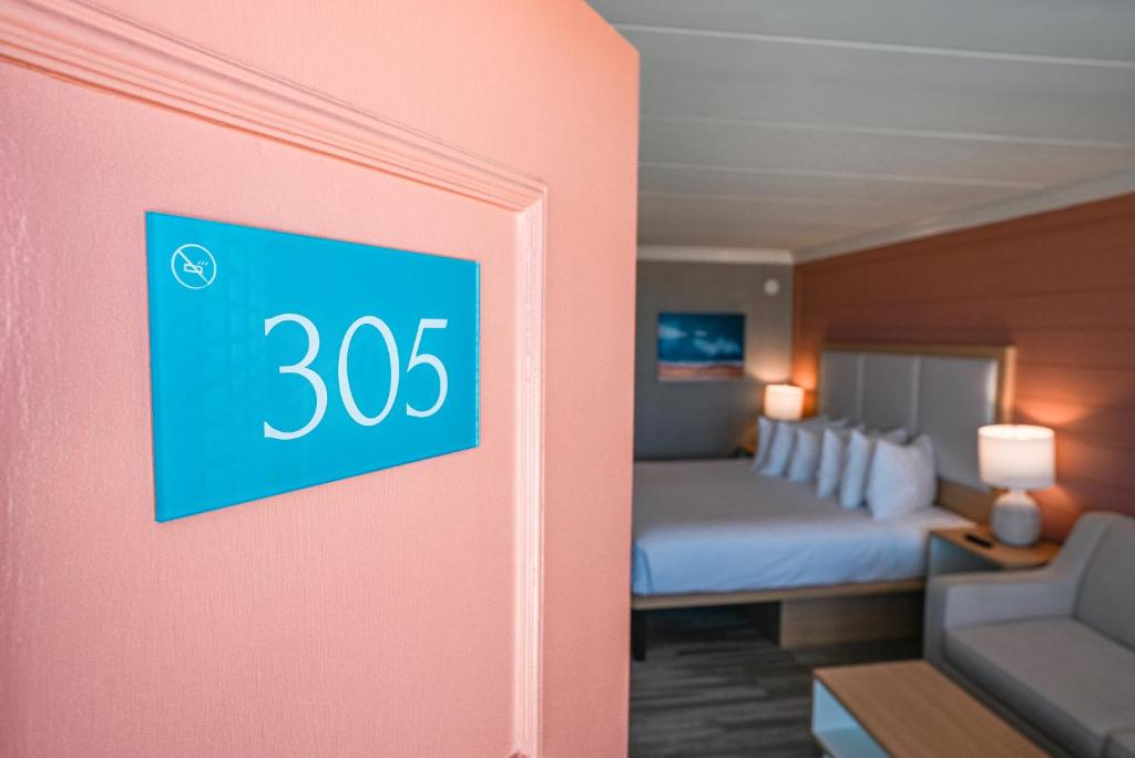 Postel nebo postele na pokoji v ubytování Spray Beach Hotel