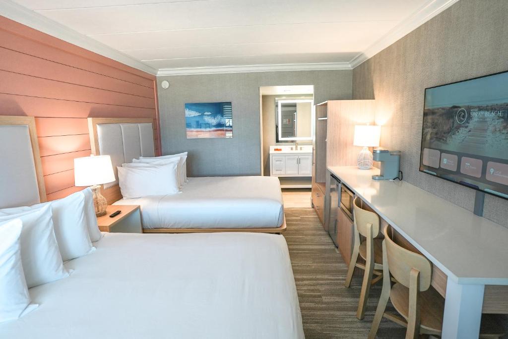 Postel nebo postele na pokoji v ubytování Spray Beach Hotel