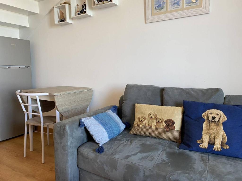 Posezení v ubytování 352 - Appartement T2 avec une vue imprenable sur le Cap Fréhel