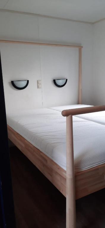 Postel nebo postele na pokoji v ubytování Chalet Veluwe G10 Veldkamp 4 Personen