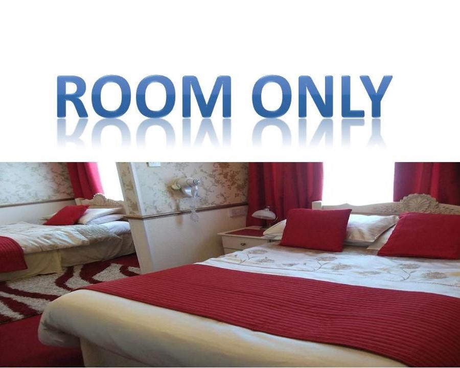 a room with two beds and a room only sign at The Brema Hotel in Blackpool