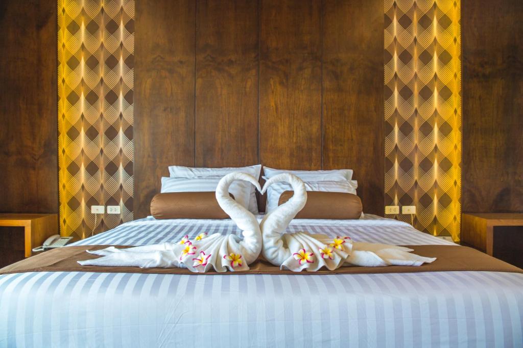 Phi Phi Cliff Beach Resort客房内的一张或多张床位