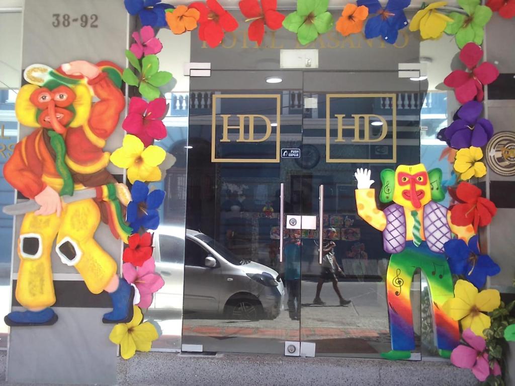 a window of a store with decorations on it at HOTEL DASANTO HD in Barranquilla