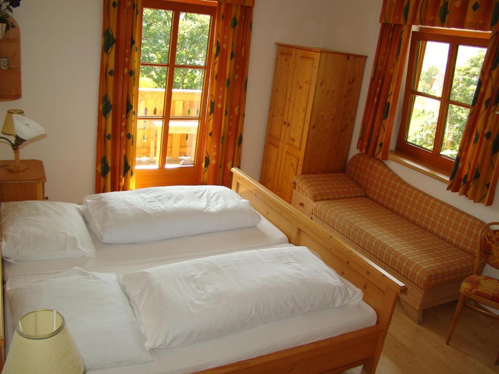 Postel nebo postele na pokoji v ubytování Panoramahaus Steiner