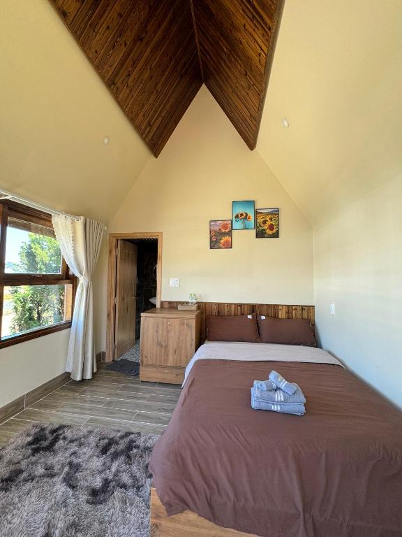 Postel nebo postele na pokoji v ubytování Nhà Sói Homestay Da Lat
