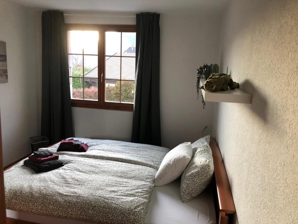 Letto o letti in una camera di Auberge Les Rangs