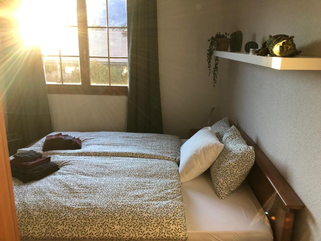 Letto o letti in una camera di Auberge Les Rangs