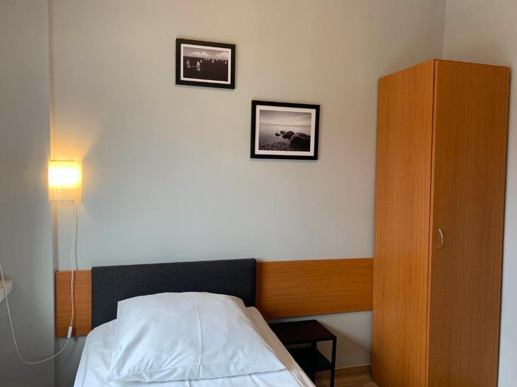 Posteľ alebo postele v izbe v ubytovaní Premium Hostel & Bistro - HostelPremium pl