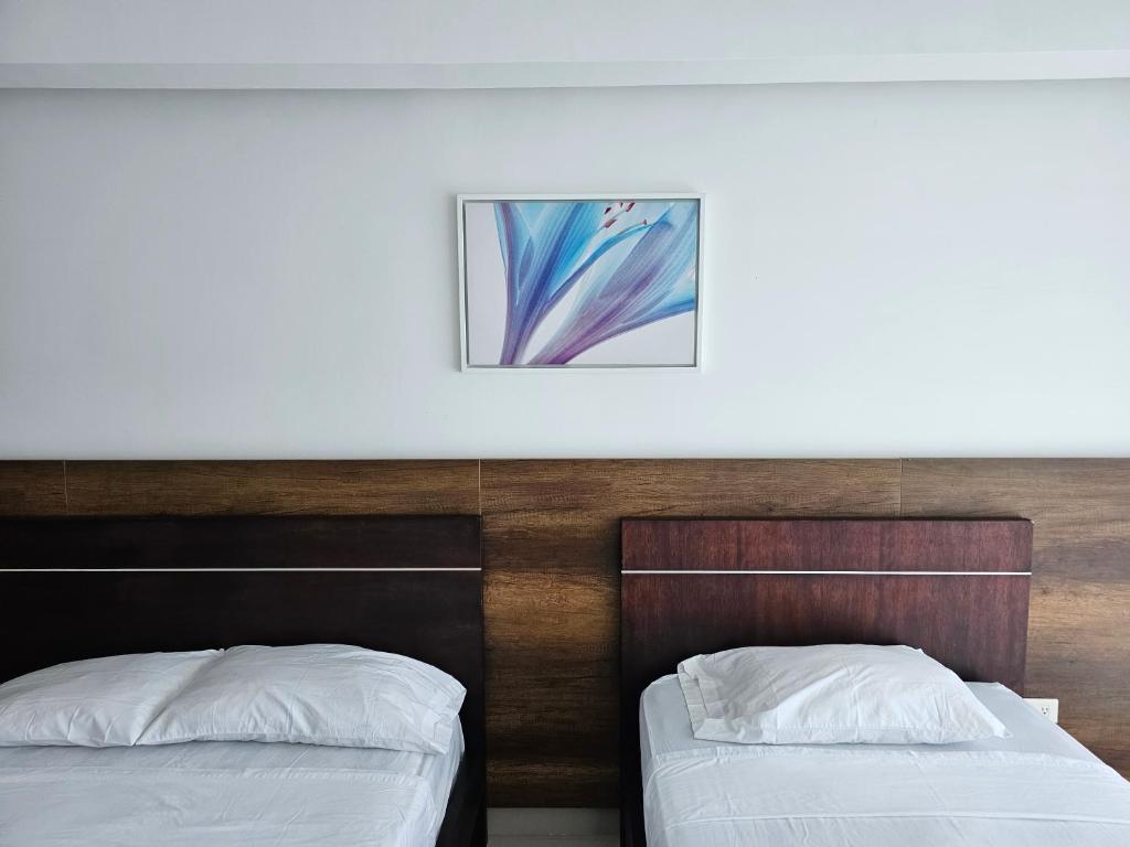 Postel nebo postele na pokoji v ubytování Resort Playa Azul Departamentos