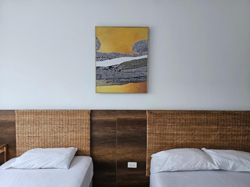 Postel nebo postele na pokoji v ubytování Resort Playa Azul Departamentos