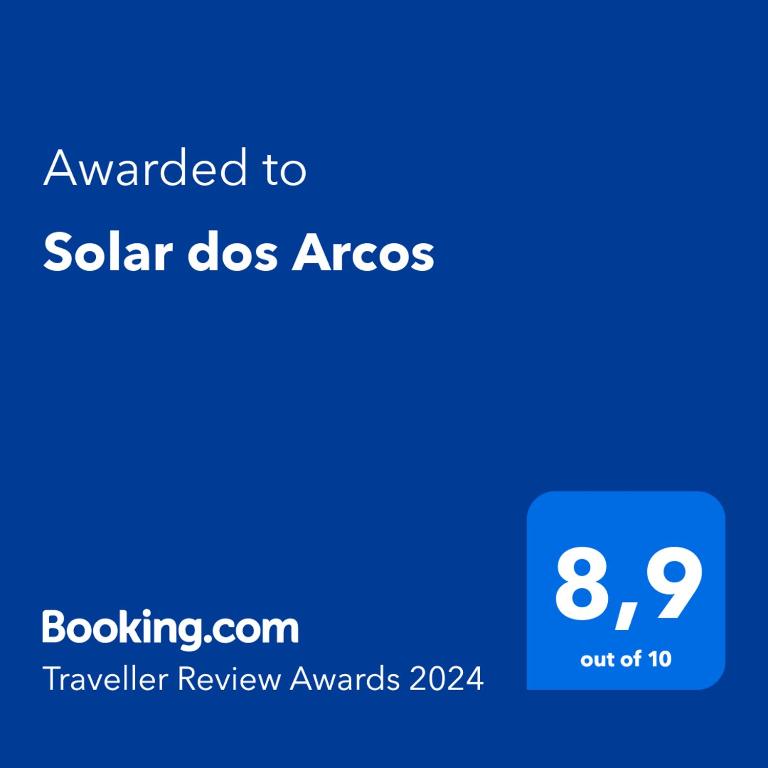 a blue screen with the text awarded to solar dog arcus at Solar dos Arcos in Praia do Forte