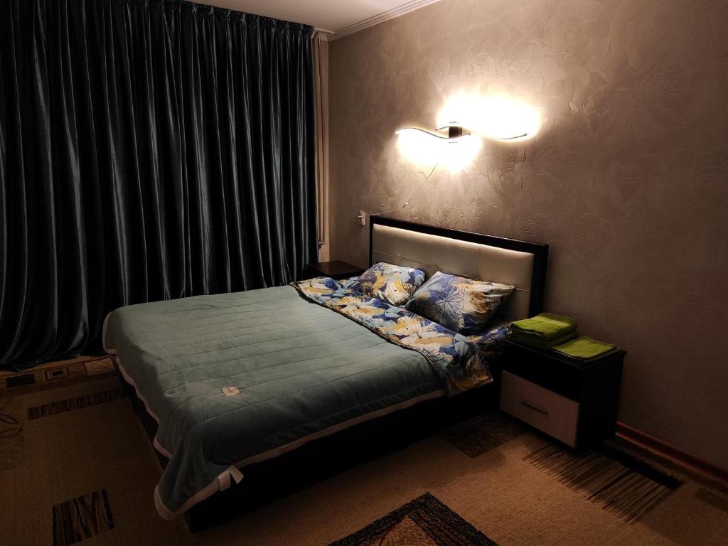 מיטה או מיטות בחדר ב-Квартира LUX, Lux apartment