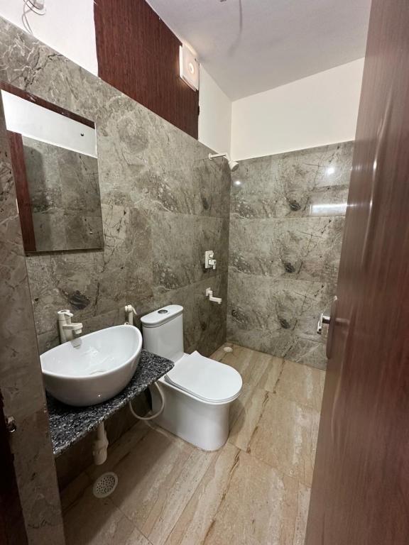 Koupelna v ubytování Sheela Homestay