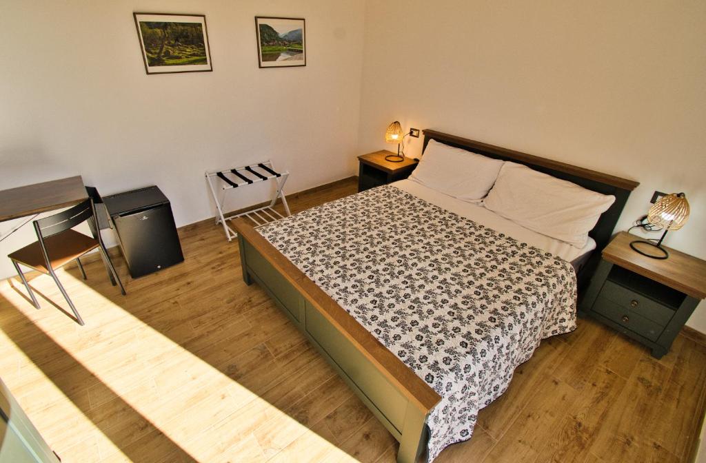 Postel nebo postele na pokoji v ubytování Dommu Livia