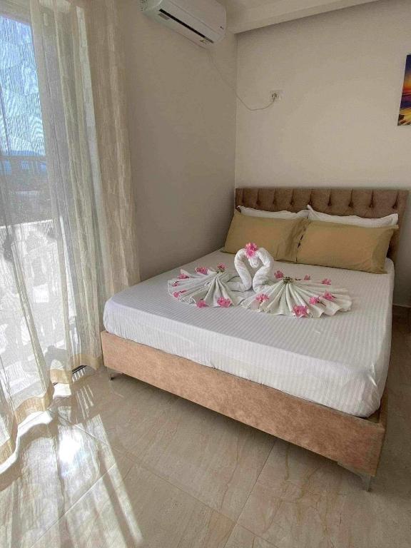 Postel nebo postele na pokoji v ubytování Villa Festim Ksamil