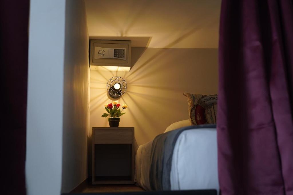 Voodi või voodid majutusasutuse Hotel Dorado Plaza Getsemaní toas