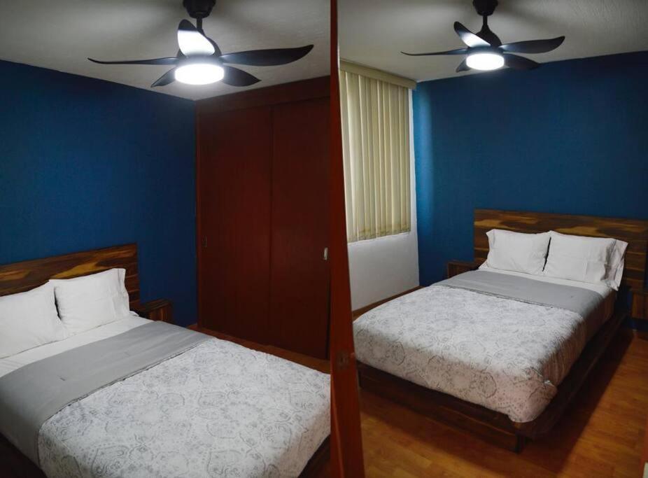 Ένα ή περισσότερα κρεβάτια σε δωμάτιο στο Preciosa y Cómoda Casa en Coto Tlaquepaque Centro.