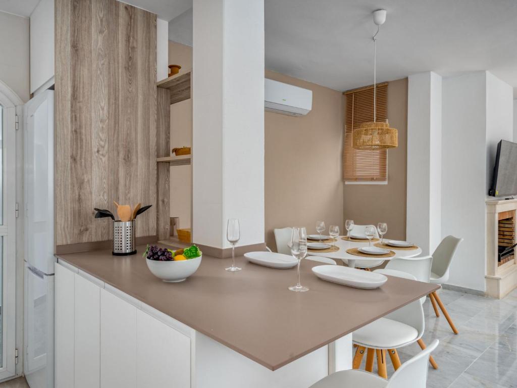 Kuchyň nebo kuchyňský kout v ubytování Apartment Ático Los Pelicanos by Interhome
