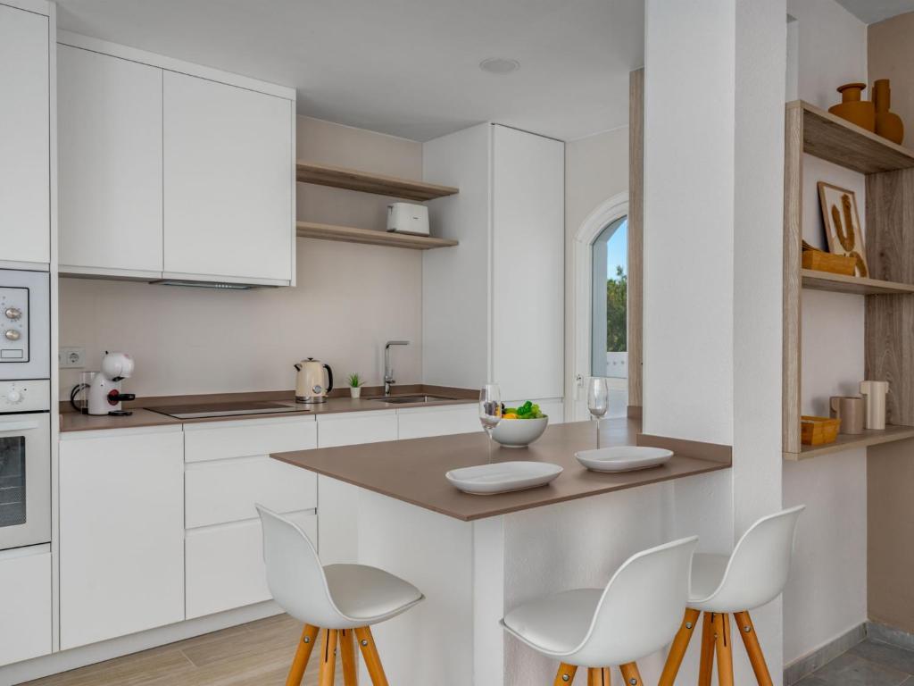 Kuchyň nebo kuchyňský kout v ubytování Apartment Ático Los Pelicanos by Interhome