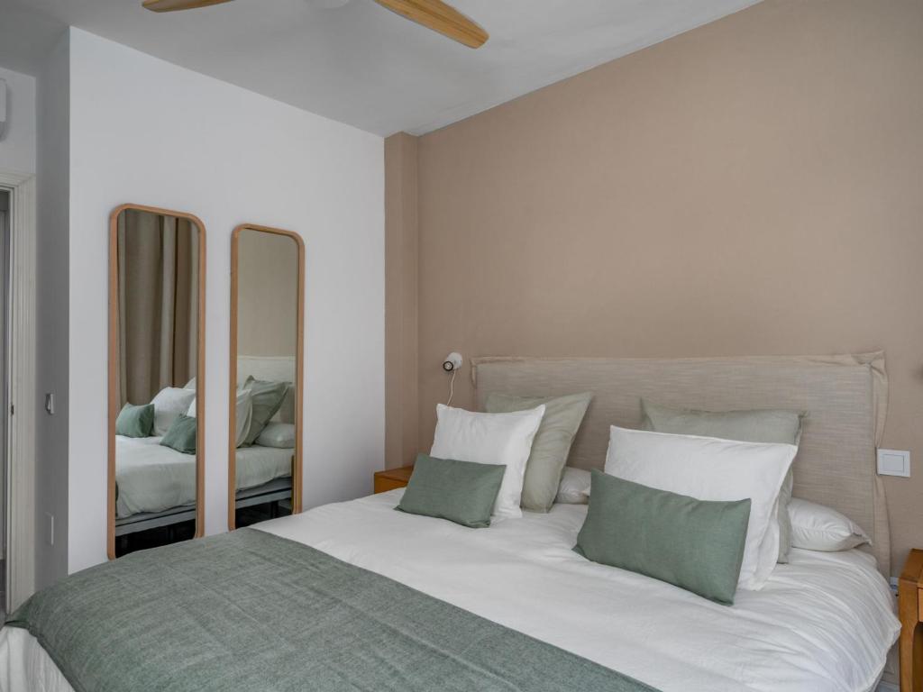 Postel nebo postele na pokoji v ubytování Apartment Ático Los Pelicanos by Interhome