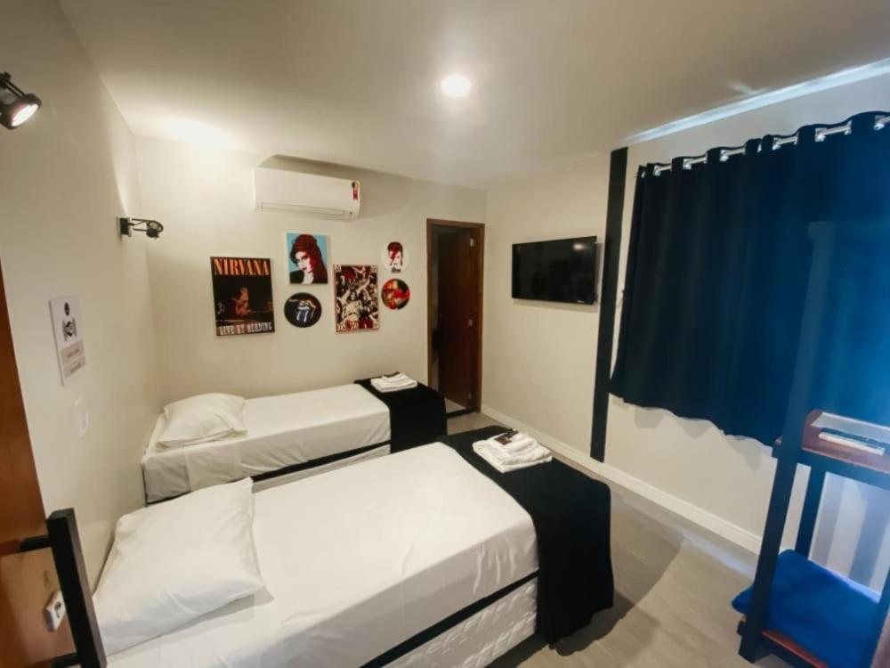 Łóżko lub łóżka w pokoju w obiekcie Living Hotel São Paulo