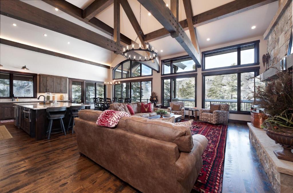 a large living room with a couch and a bar at 262 Sultan Drive in Durango Mountain Resort