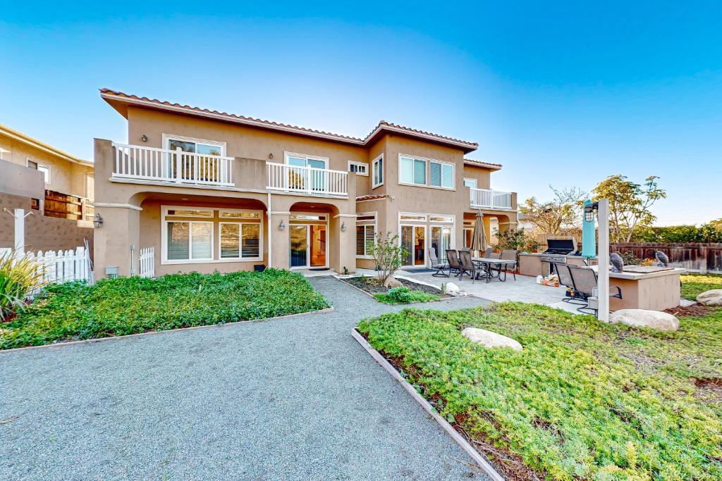 a large house with a patio in front of it at Bay Park Villa in San Diego