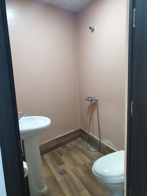Koupelna v ubytování Hotel Amigo