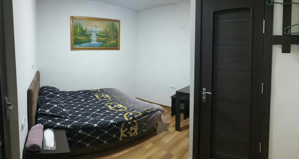 Postel nebo postele na pokoji v ubytování Hotel Amigo