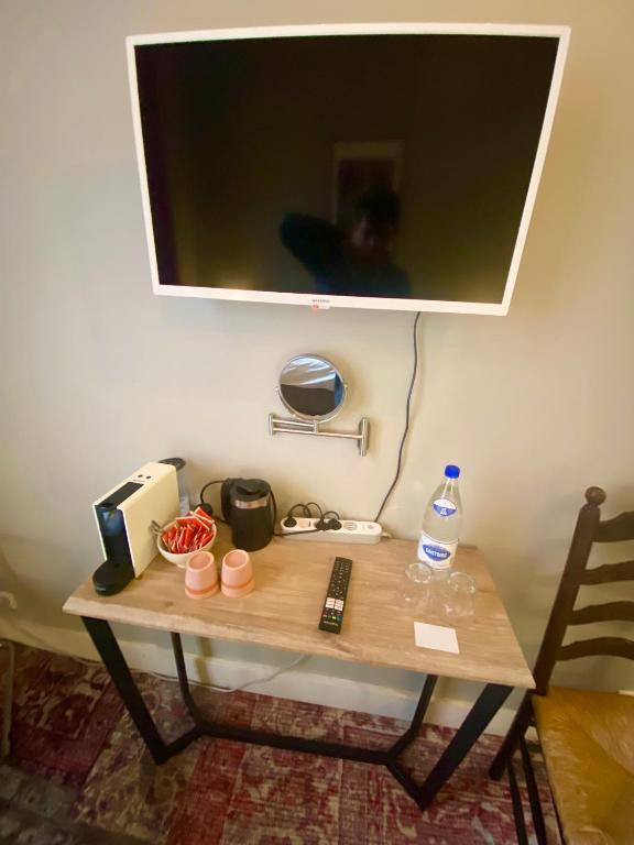 TV o dispositivi per l'intrattenimento presso Simone's Kitchen B&B