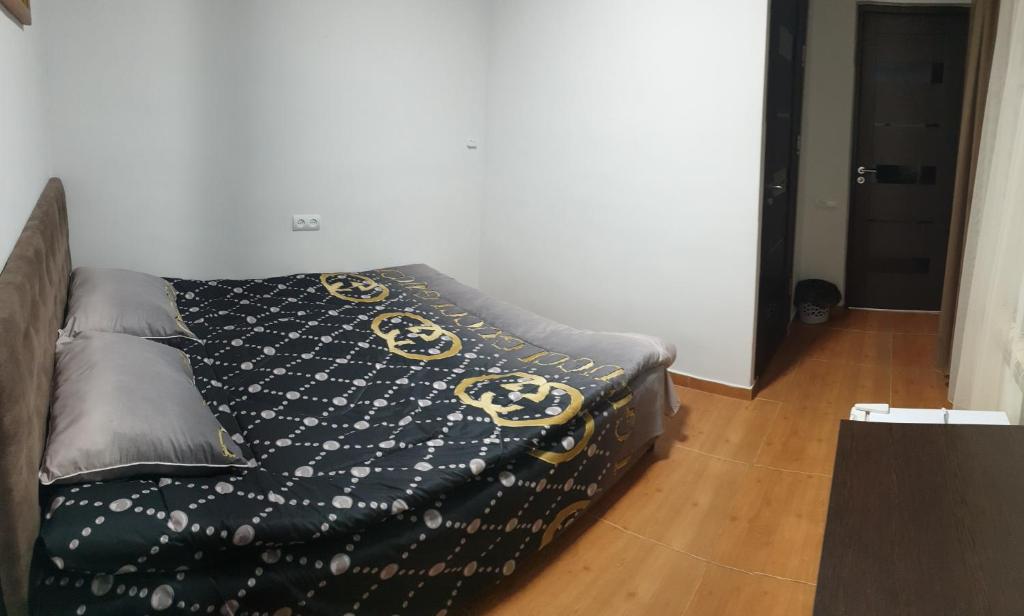 Postel nebo postele na pokoji v ubytování Hotel Amigo