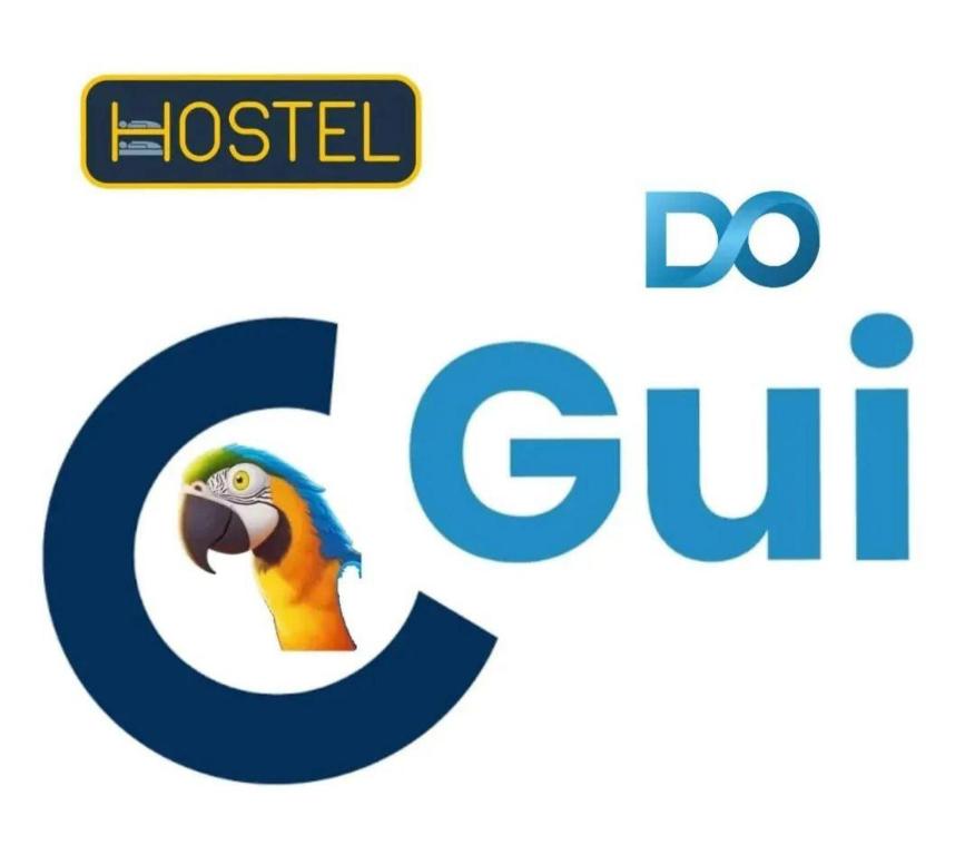 a logo with a parrot in the center of a letter g at Hostel do Gui in Alto Paraíso de Goiás