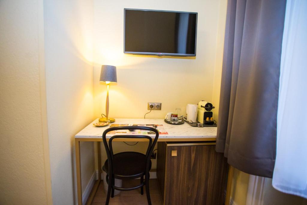 Příslušenství pro přípravu čaje a kávy v ubytování Private Comfort STEPHANSPLATZ - SELF CHECK IN