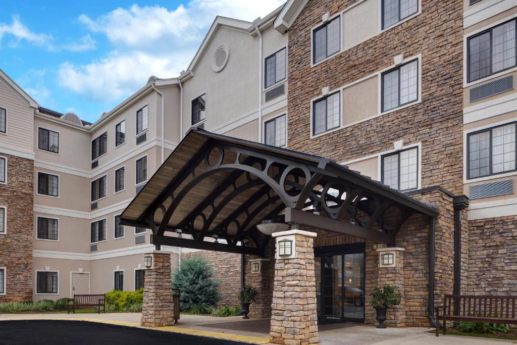 a building with an archway in front of a building at Staybridge Suites Tallahassee I-10 East, an IHG Hotel in Tallahassee