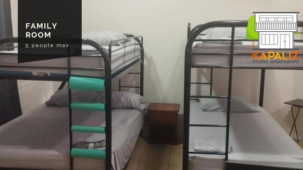 Postel nebo postele na pokoji v ubytování KAPALIZ
