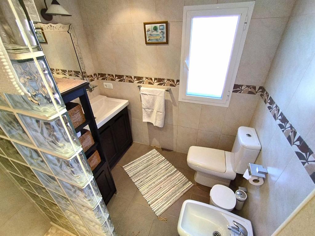 Koupelna v ubytování Evans Realty AL Villa & Piscina & Garaje & Playa
