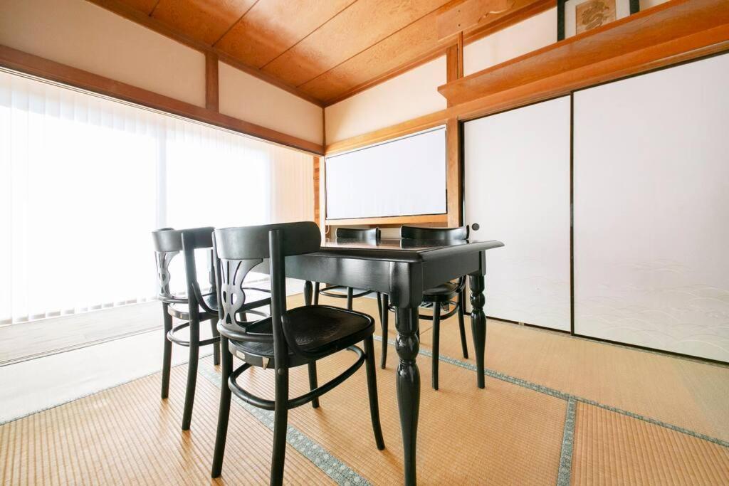 Fotografie z fotogalerie ubytování 湯河原「ゲストハウス城堀の家」 v destinaci Jugawara