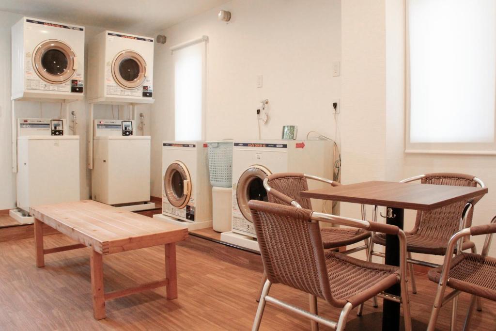 Kuchyň nebo kuchyňský kout v ubytování Hostel Wasabi Asakusa