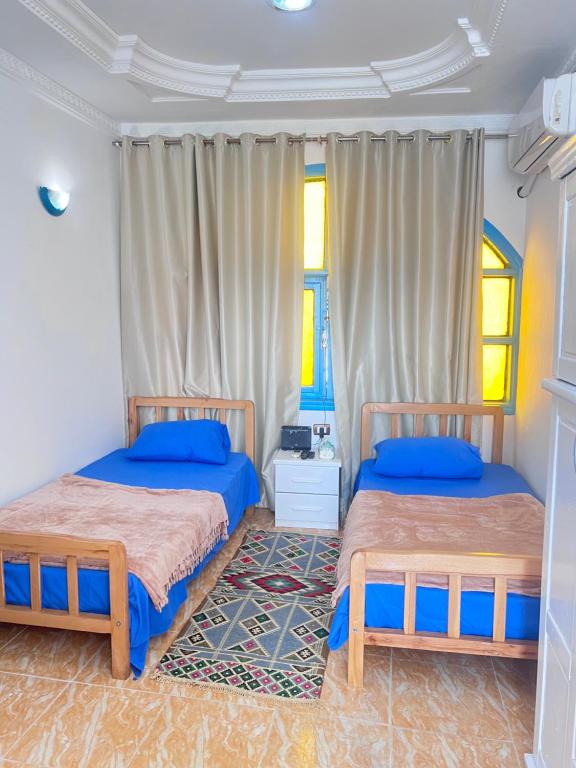 a bedroom with two beds in a room at Fresh studio in Dahab in Dahab