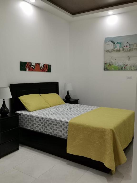 Postel nebo postele na pokoji v ubytování 935 Lodge San José