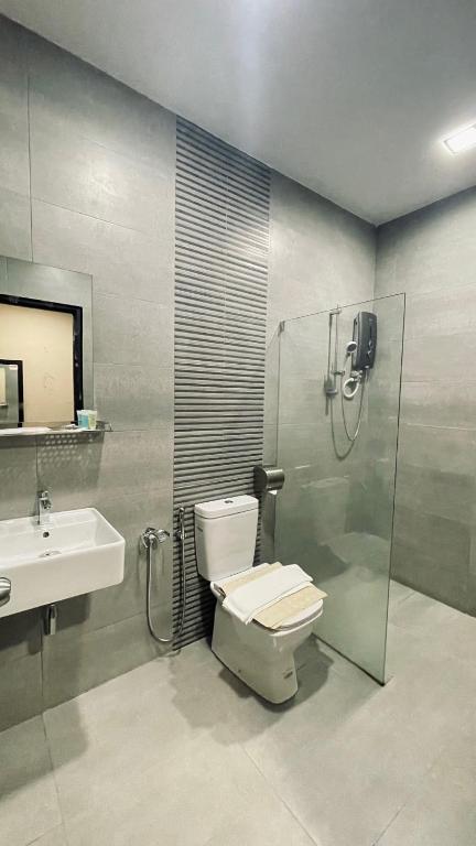 Koupelna v ubytování De Parkview Hotel