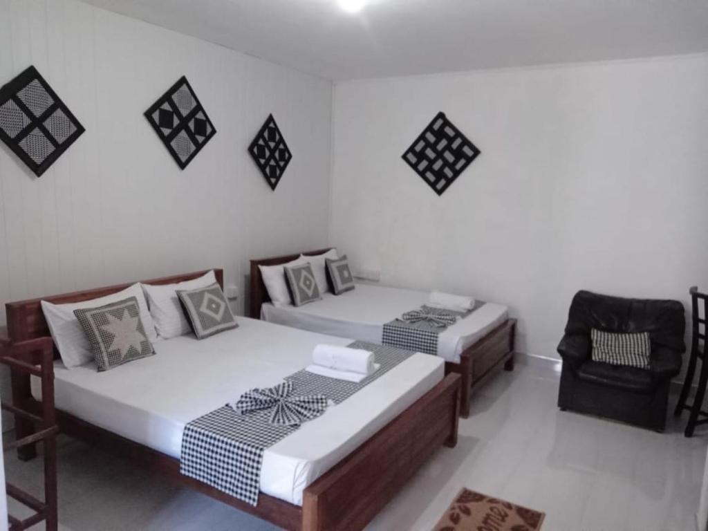 Postel nebo postele na pokoji v ubytování Zuni`s Home Stay