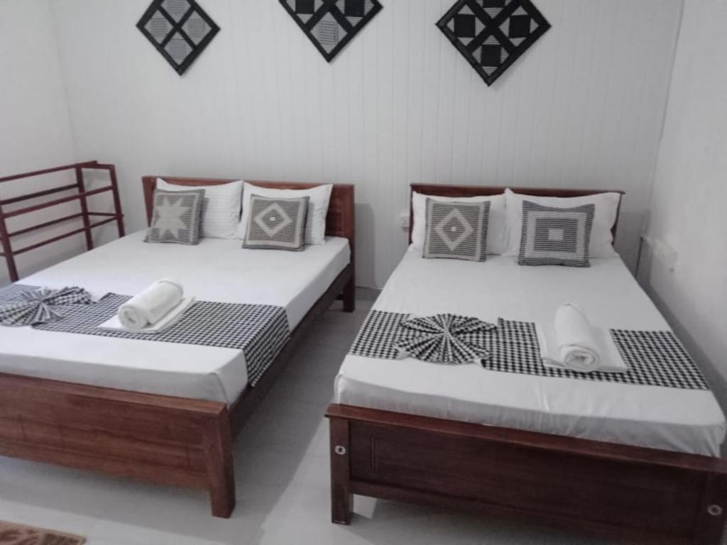 Postel nebo postele na pokoji v ubytování Zuni`s Home Stay