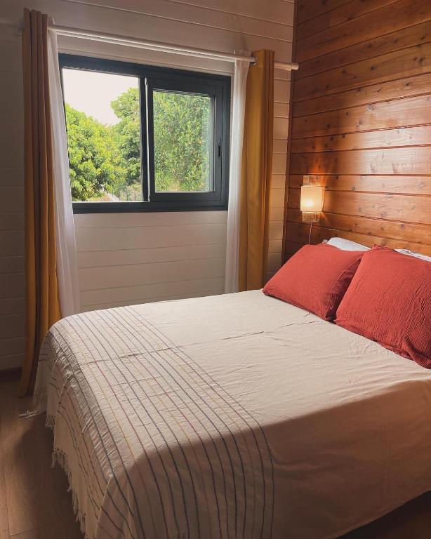 Postel nebo postele na pokoji v ubytování Austral House-chalet sud sauvage
